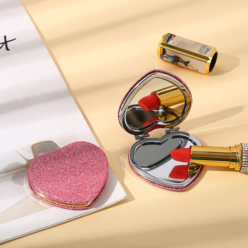 Eleganter, herzförmiger, glitzernder, faltbarer Kosmetikspiegel – roségoldener Rahmen, hypoallergenes Metall, tragbar und praktisch für Mädchen